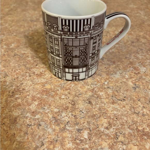 Retired! Henri Bendel Brown and White Mug anniversary edition.